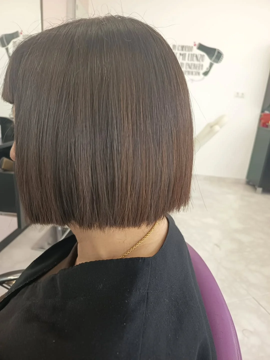 timeless summer haircuts for women over 40 2026 Precision Brunette Bob With Clean Lines