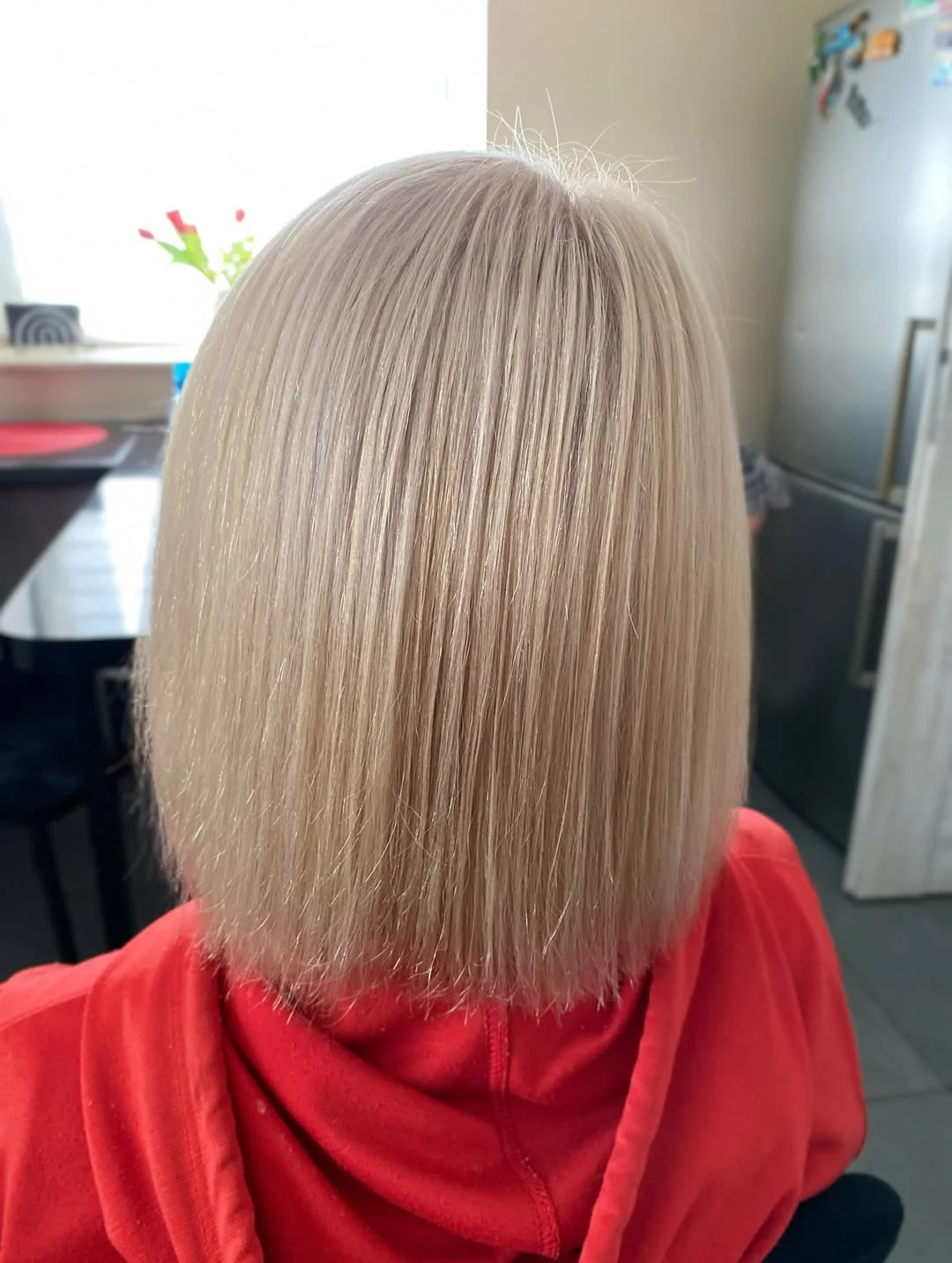 timeless summer haircuts for women over 40 2026 Silky Vanilla Blonde Blunt Cut