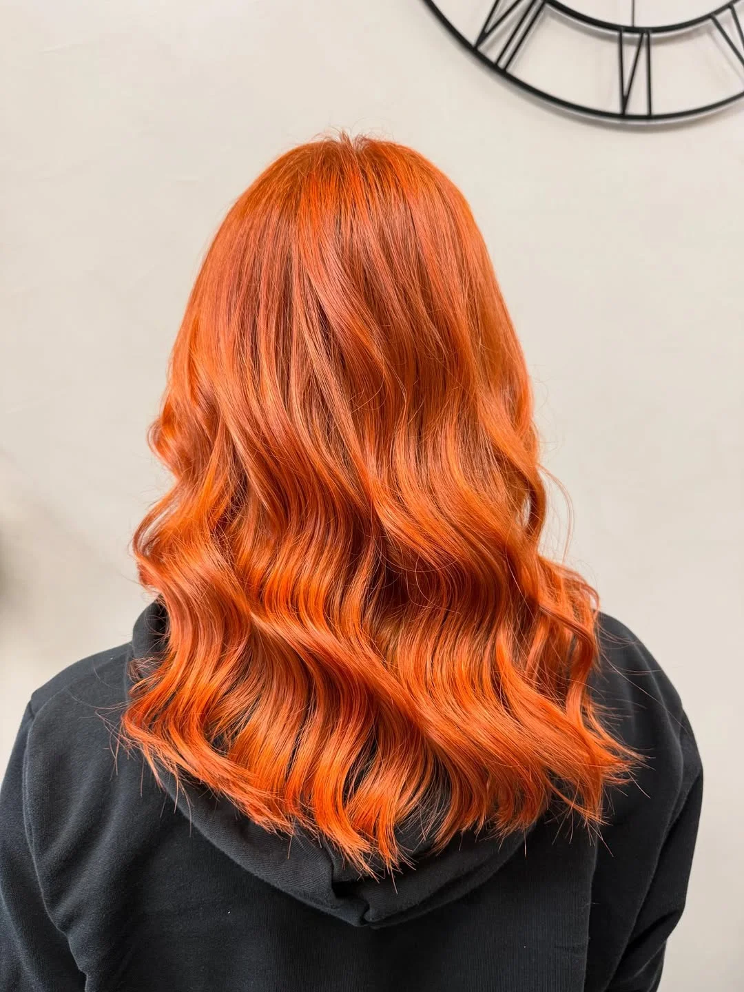 timeless summer haircuts for women over 40 2026 Vibrant Copper Waves With Glossy Dimension