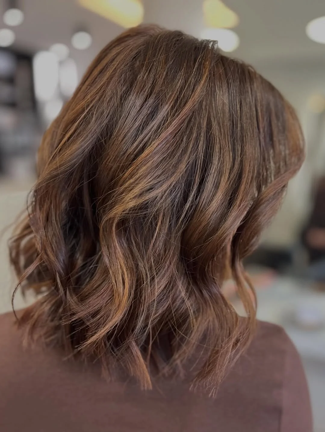 toffee summer brunette hair color 2026 Soft Layered Toffee Lob with Airy Movement