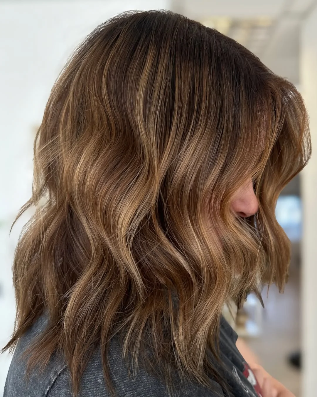 toffee summer hair color for tan skin 2026 Layered Toffee Lob With Soft Caramel Movement
