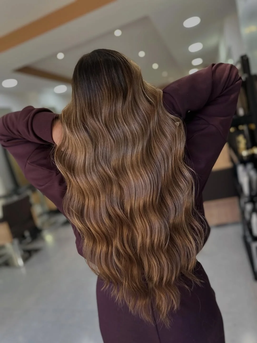 toffee summer hair color for tan skin 2026 Soft Cinnamon Toffee Waves With Luxe Dimension
