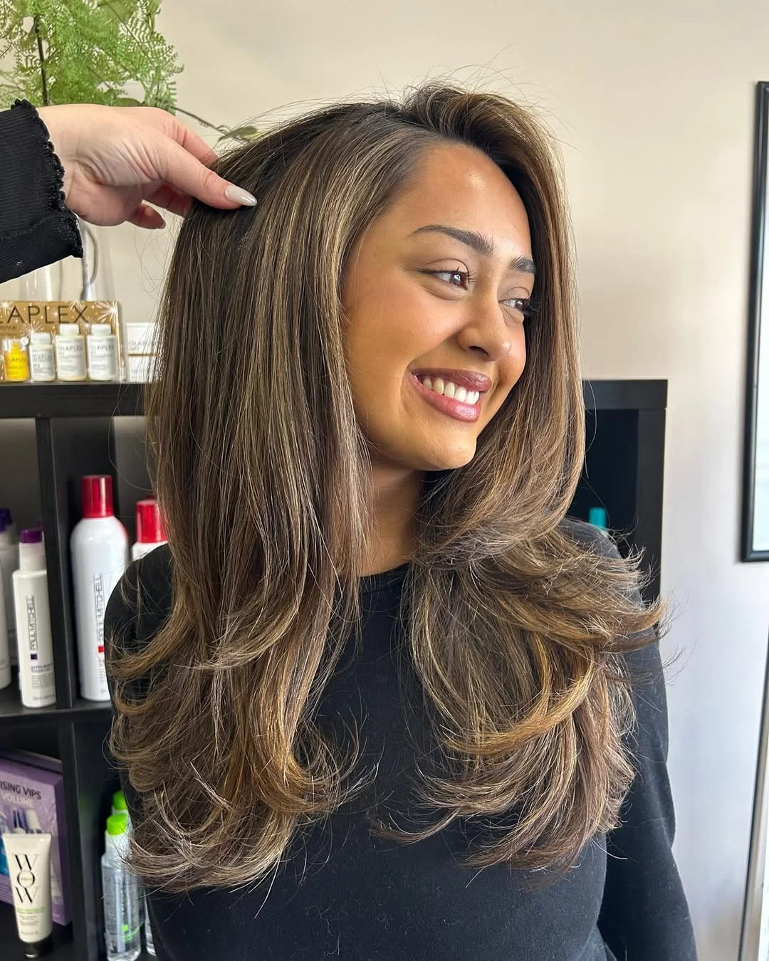 toffee summer hair color for tan skin 2026 Layered Toffee Blowout With Face-Framing Brightness