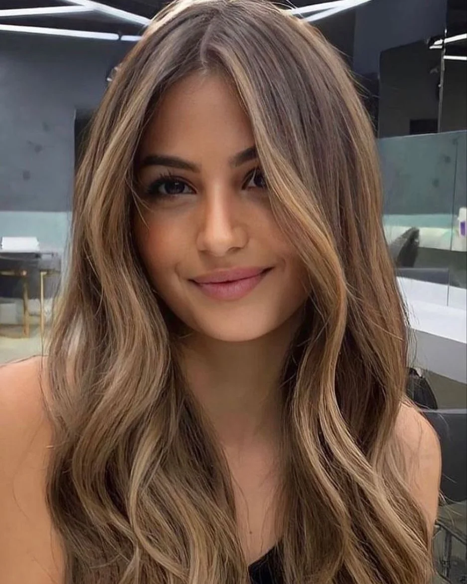 toffee summer hair color for tan skin 2026 Beachy Toffee Waves With Face-Framing Brightness