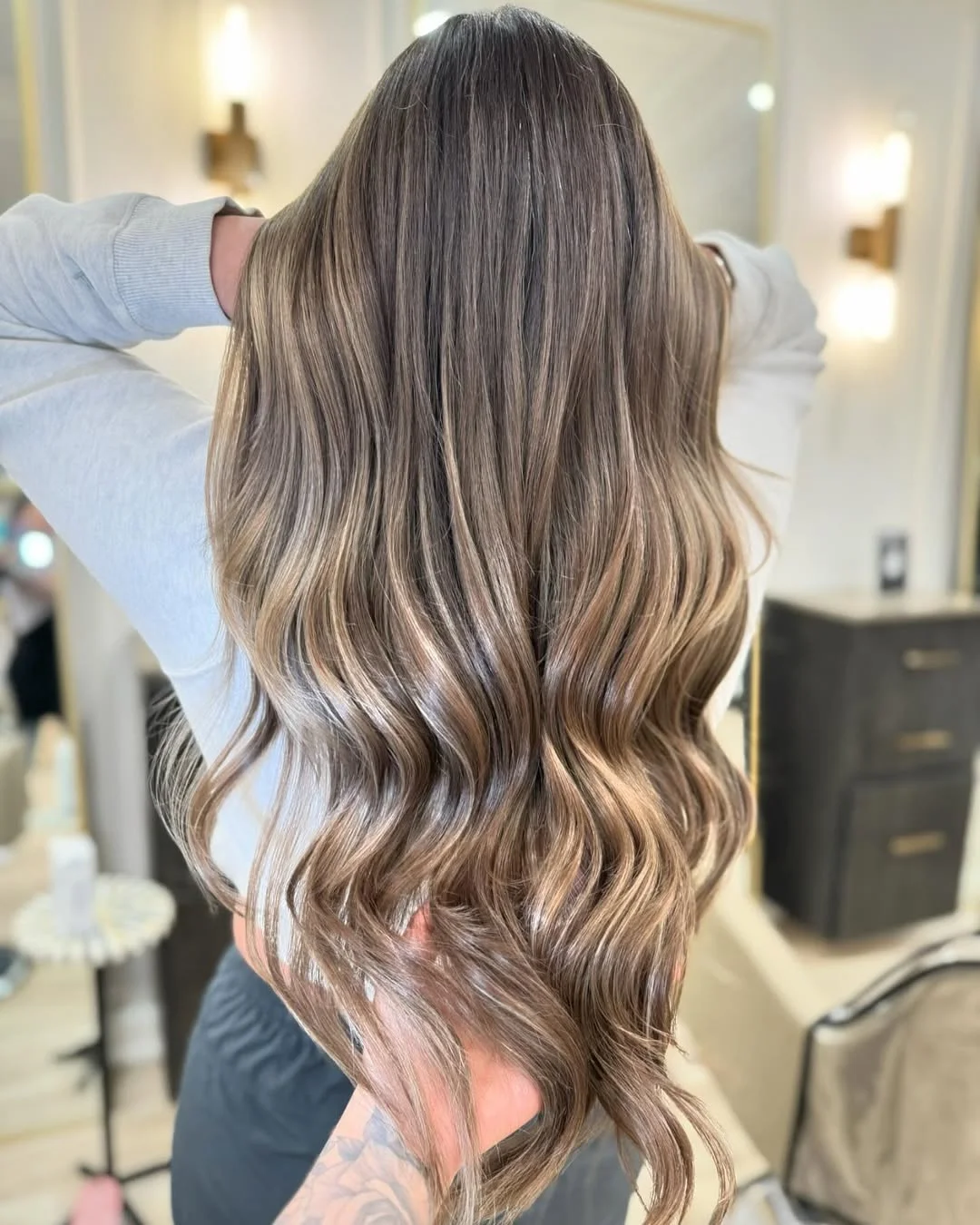toffee summer hair color for tan skin 2026 Champagne Toffee Balayage With Luxe Ribbon Highlights