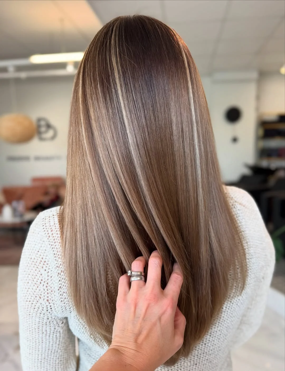 toffee summer hair color for tan skin 2026 Cool Beige Toffee With Sleek Satin Finish