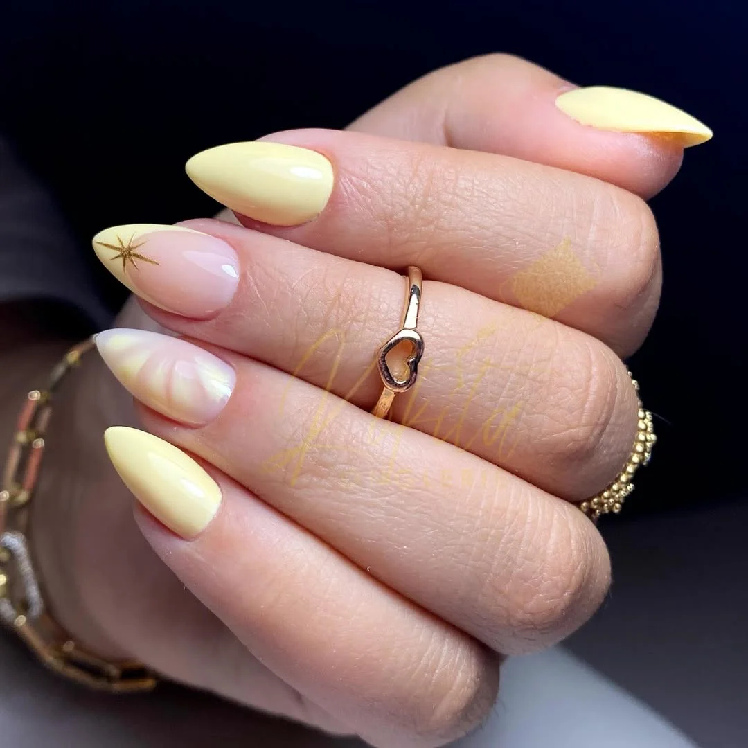 trendy summer nails 2026 Butter Yellow Almond Nails with Soft Golden Accents