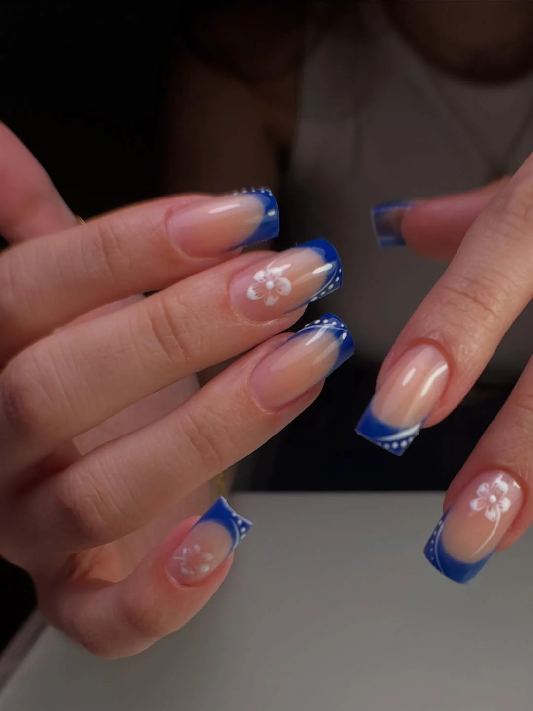 trendy summer nails 2026 Blue French Tip Nails with Delicate Summer Florals