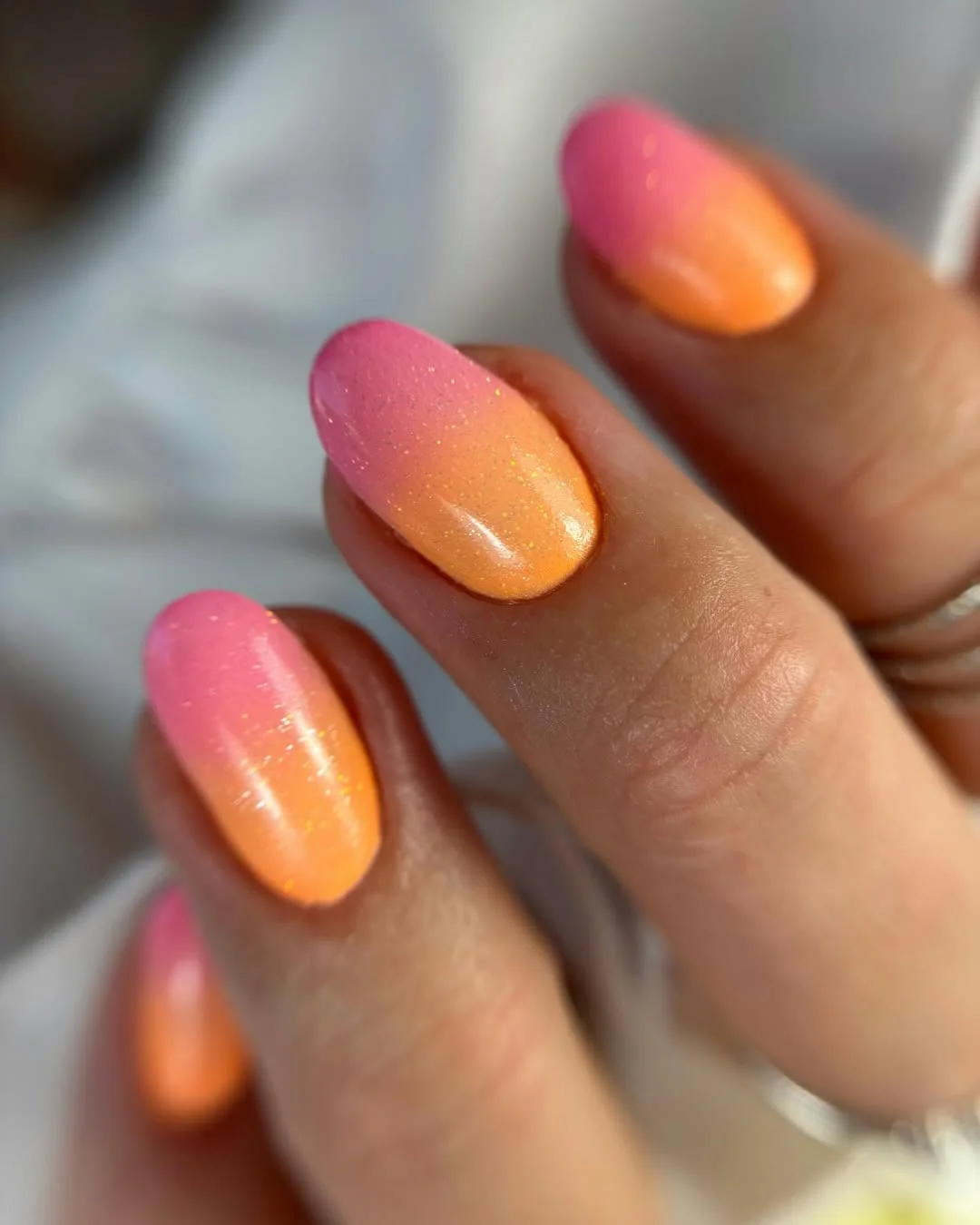 trendy summer nails 2026 Sunset Sorbet Ombre Nails with Soft Sparkle