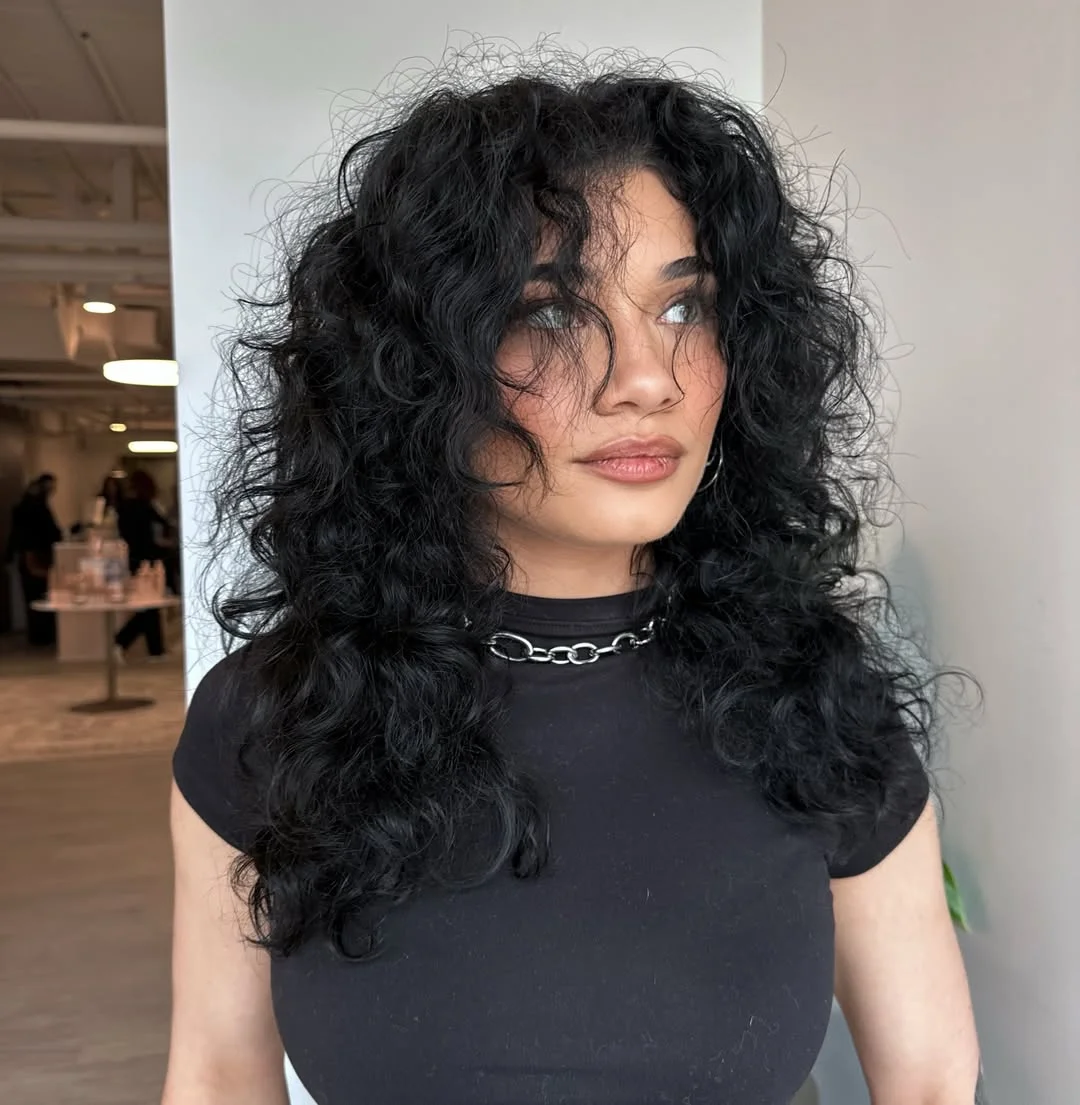 voluminous summer shag hairstyle 2026 Voluminous Curly Shag with Bold Texture