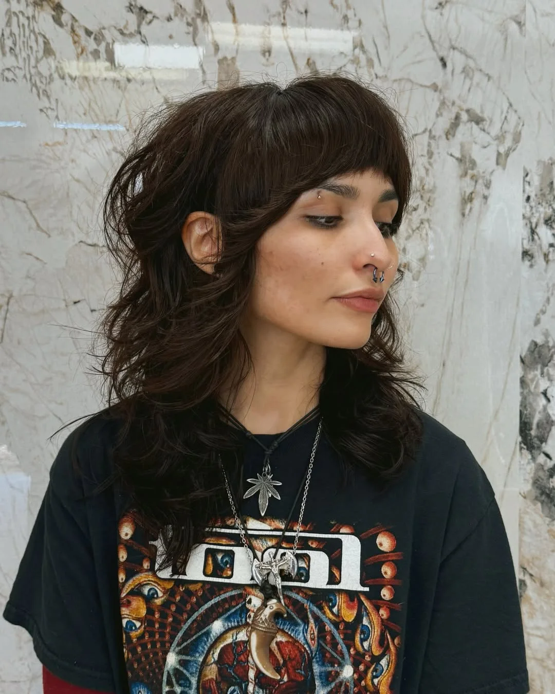 voluminous summer shag hairstyle 2026 Dark Textured Shag with Micro Bangs Edge