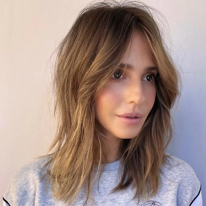 voluminous summer shag hairstyle 2026 Sunlit Brunette Shag with Face-Framing Layers